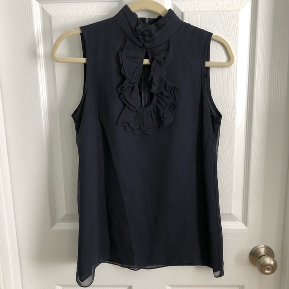Nanette Lepore Tops - 100% silk navy Nanette Lepore sleeveless blouse Nanette Lepore Tops - 100% silk navy Nanette Lepore sleeveless blouse
